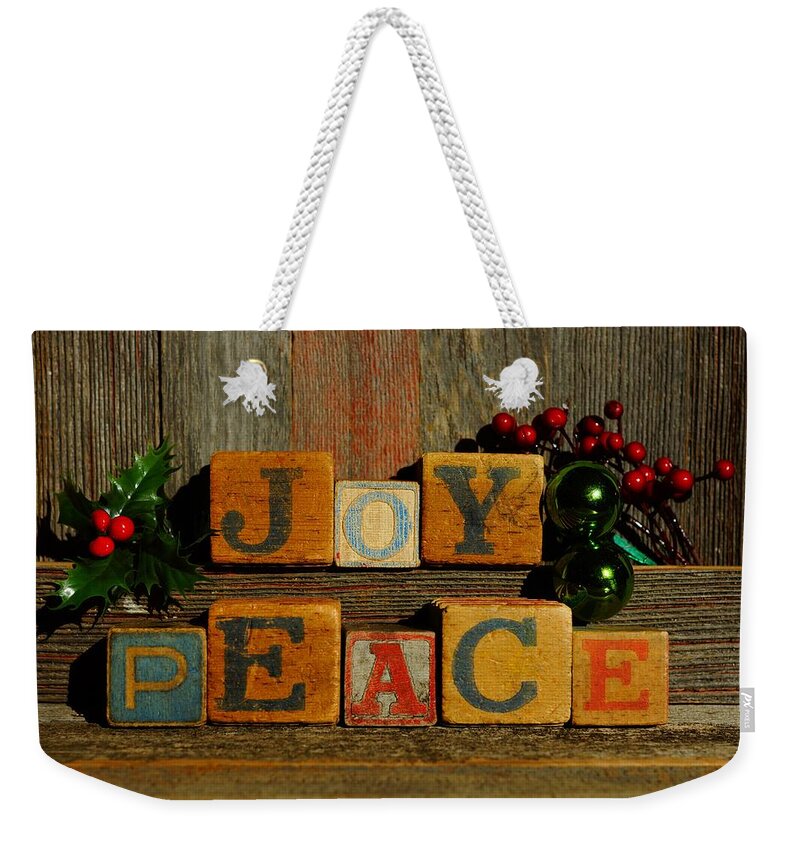 Christmas Weekender Tote Bag featuring the photograph Joy and Peace by Steven Clipperton