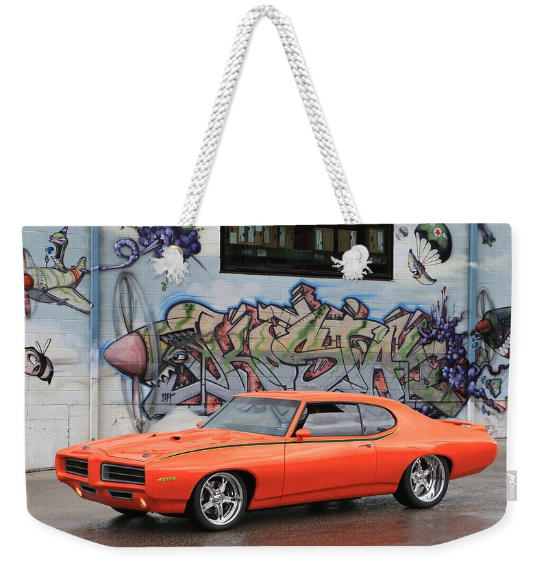 Pontiac Weekender Tote Bag featuring the photograph Judgement Day by Christopher McKenzie