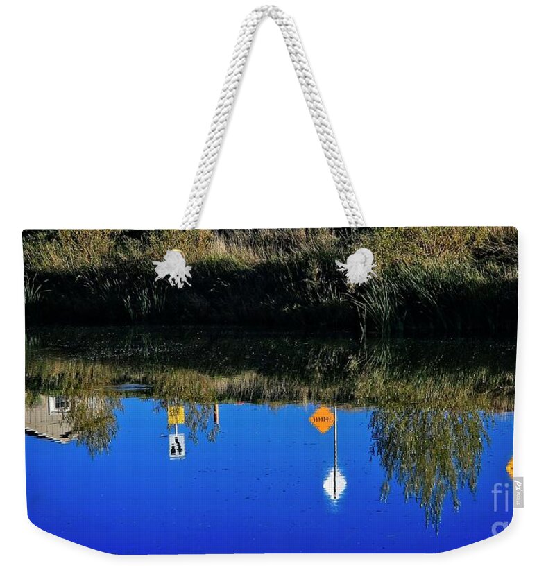 Just Reflection On Last Year Weekender Tote Bag featuring the photograph Just Reflecting On Last Year by Jon Burch Photography
