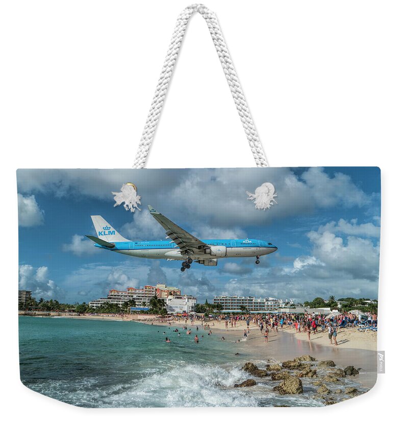 Klm Weekender Tote Bag featuring the photograph K L M A330 landing at SXM by David Gleeson