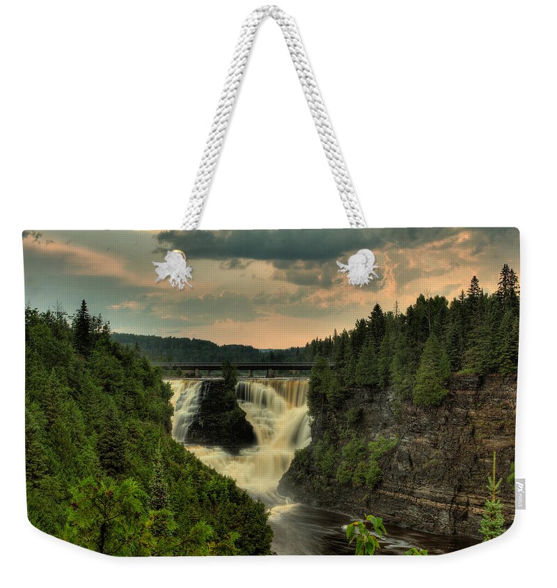 Green Mantle Weekender Tote Bag featuring the photograph Kakabeka Falls After a Storm by Jakub Sisak
