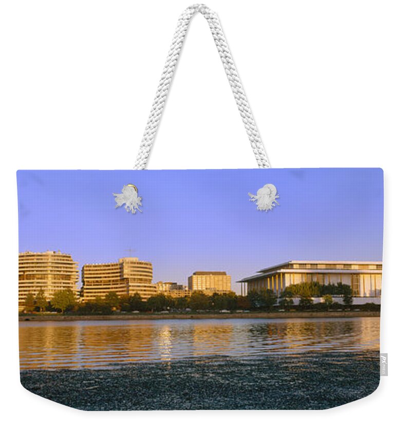Photography Weekender Tote Bag featuring the photograph Kennedy Center And Watergate Hotel by Panoramic Images