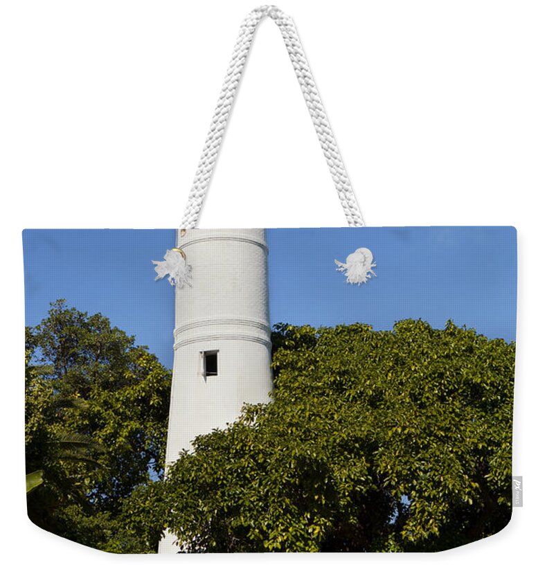 America Weekender Tote Bag featuring the photograph Key West Lighthouse in Florida by Anthony Totah