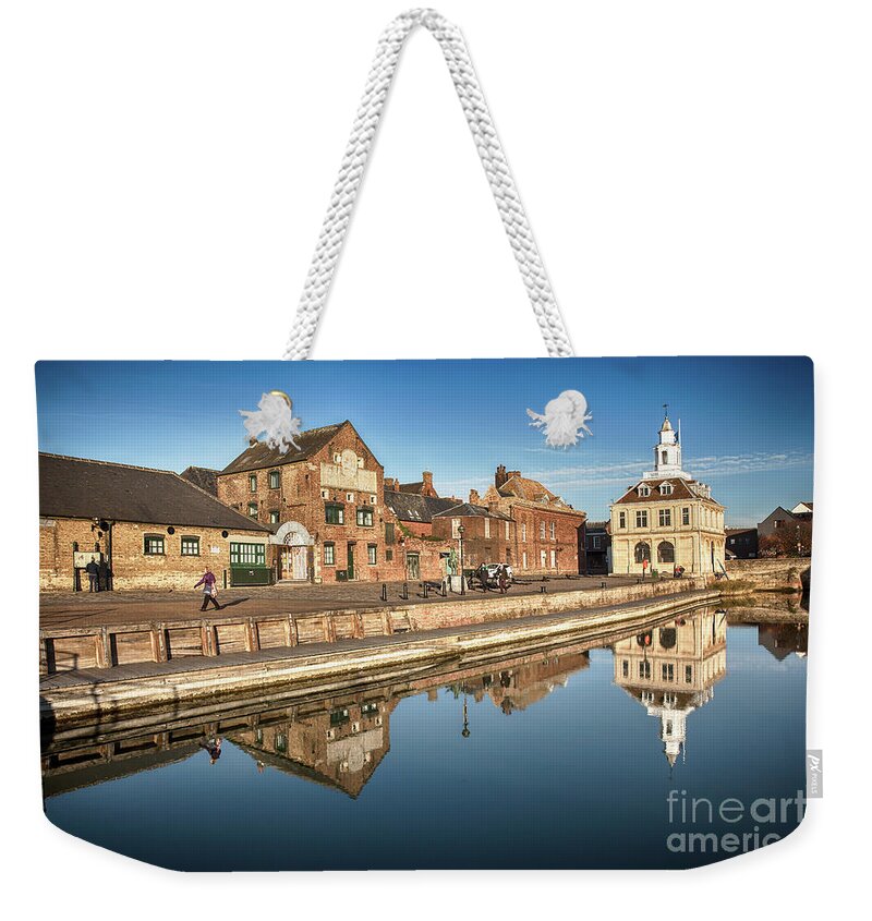 Kings Lynn Weekender Tote Bag featuring the photograph Kings Lynn Purfleet Quay in Norfolk by Simon Bratt