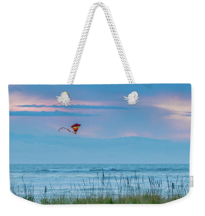 Sunset Weekender Tote Bag featuring the photograph Kite in the Air at Sunset by E Faithe Lester