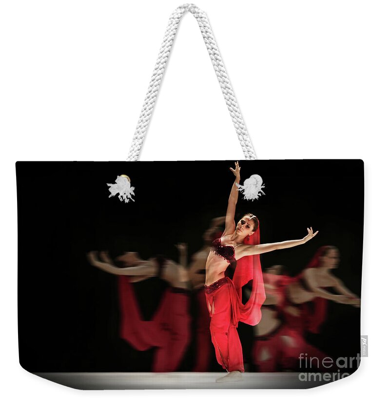 Ballet Weekender Tote Bag featuring the photograph La Bayadere Ballerina in red tutu ballet by Dimitar Hristov