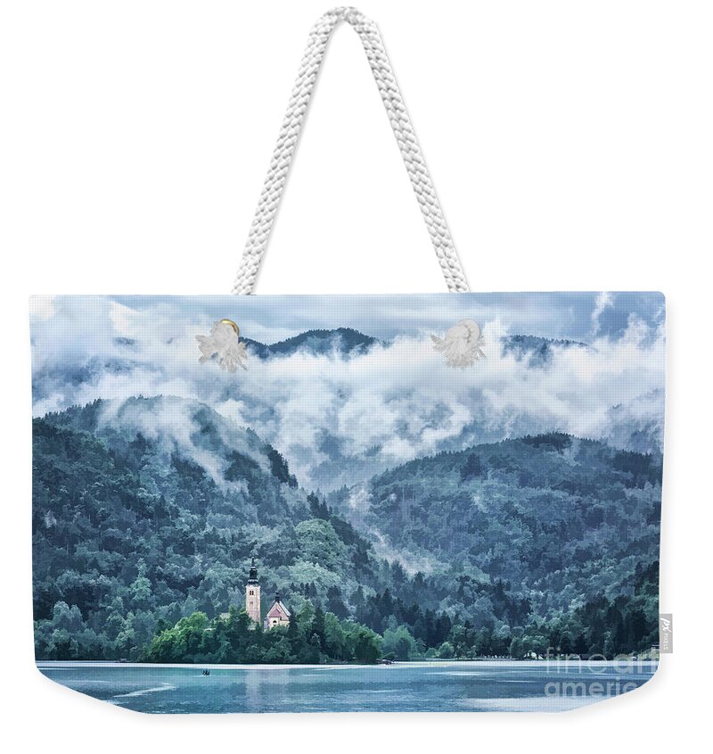 Painterly Weekender Tote Bag featuring the photograph Lake Bled in Clouds by Norman Gabitzsch