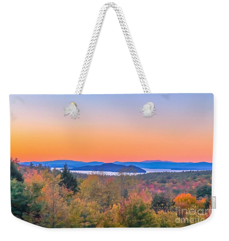 New England Weekender Tote Bag featuring the photograph Lake Winnipesaukee sunset view by Claudia M Photography