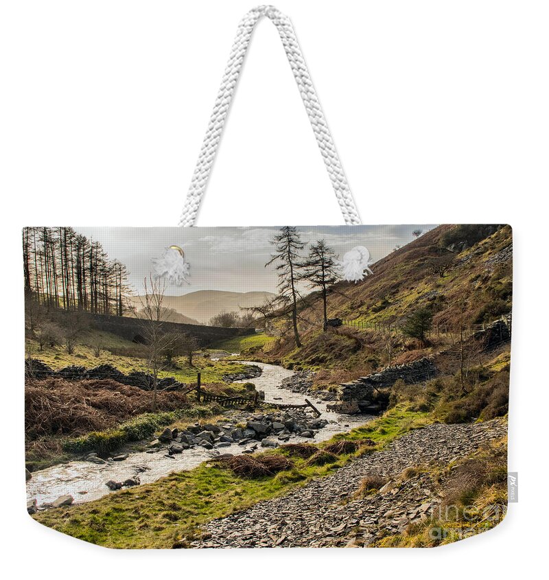 Stream - Mountains - Sky - Trees - Bridge Weekender Tote Bag featuring the photograph Lakeland Stream by Chris Horsnell