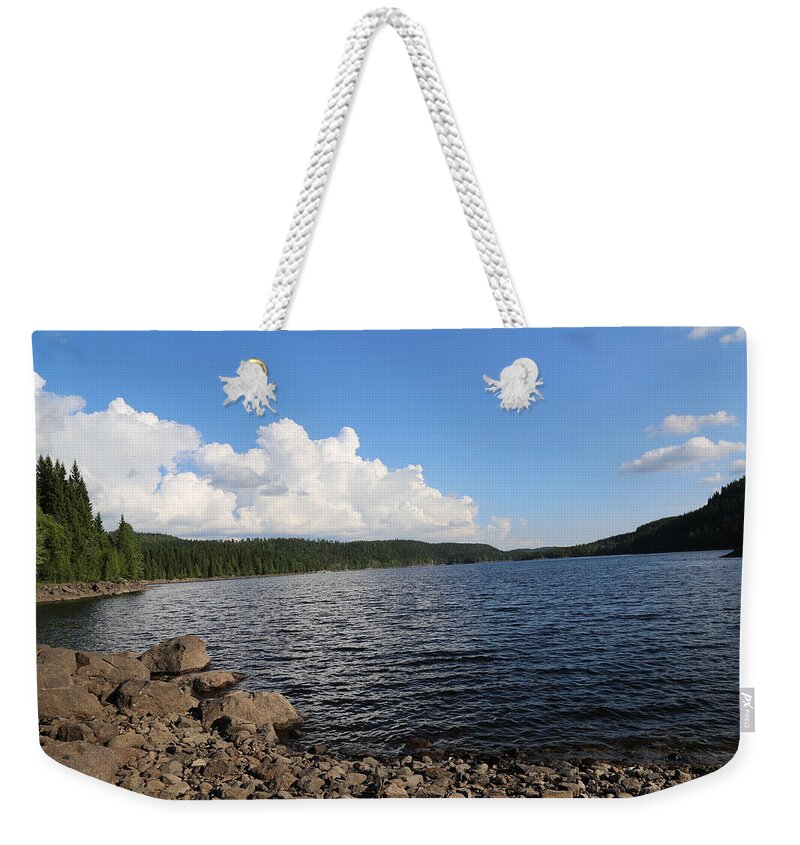 Clouds Cloud Waterfront Summer Sky Reflection Blue Grey White Beige Green Black Brown Woods Outdoors Countryside Countryliving Country Outdoors Nature Landscape View Panorama Norway Norwegen Norvegia Norge Nordmarka Scandinavia Skandinavia Norden Europe European Lake Trees Forrest Rocks Rock Woods Summer Plant Tan Turquoise Daylight Daytime Hiking Vegetation Lakeside Picnic Picnics Day Weekender Tote Bag featuring the digital art Lakeside by Jeanette Rode Dybdahl