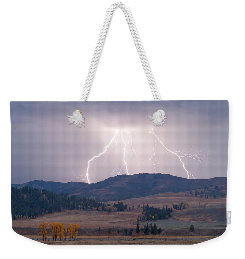 Yellowstone National Park Weekender Tote Bag featuring the photograph Lamar Lightning by Max Waugh