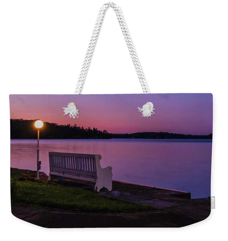 St Lawrence Seaway Weekender Tote Bag featuring the photograph Lamp And Bench by Tom Singleton