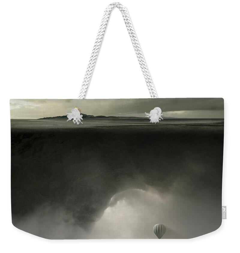 Desert Weekender Tote Bag featuring the photograph Landmass by Michal Karcz