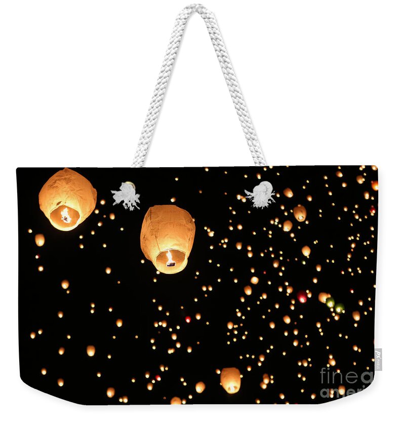 Night Weekender Tote Bag featuring the photograph Lanterns Upon the Sky by Elizabeth Winter