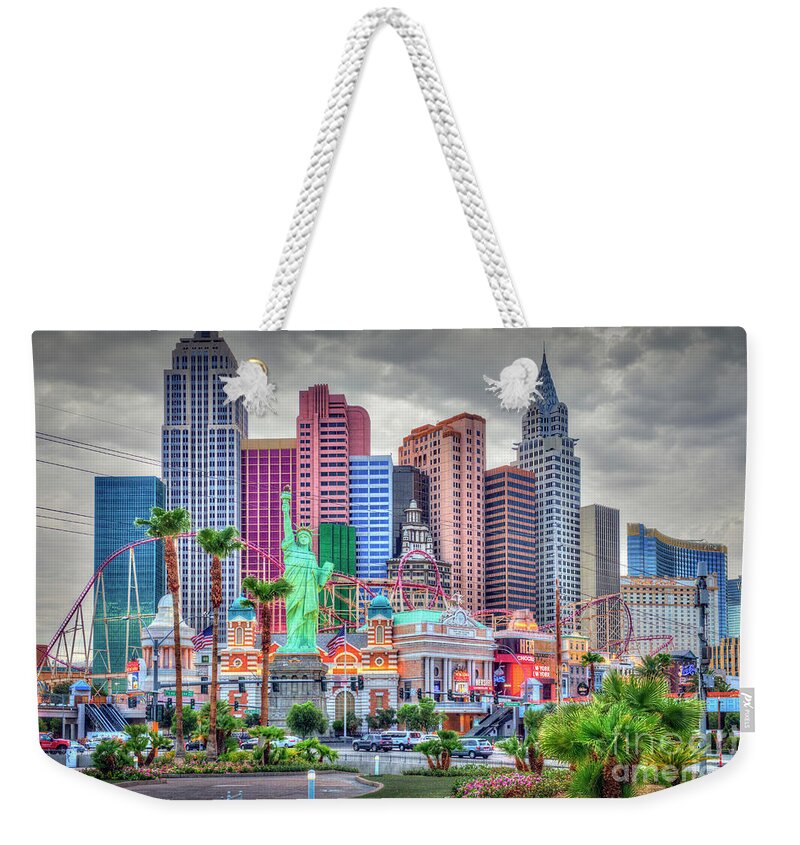 Las Vegas Weekender Tote Bag featuring the photograph Las Vegas Show Time NY NY Hotel by David Zanzinger