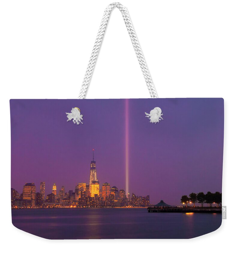 Sep 11 Weekender Tote Bag featuring the photograph Laser Twin Towers in New York City by Ranjay Mitra