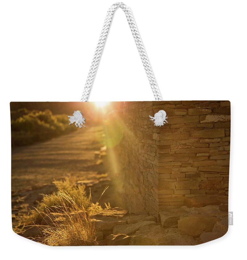 Chaco Canyon Weekender Tote Bag featuring the photograph Last rays at Pueblo Bonito by Kunal Mehra