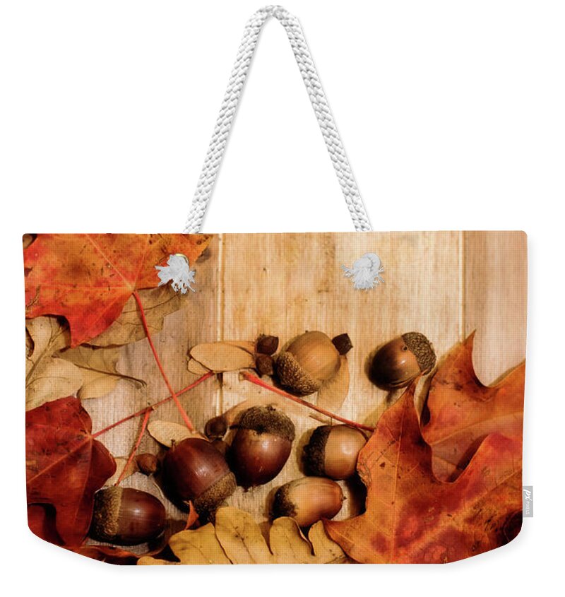 Leaves Weekender Tote Bag featuring the photograph Leaves and Nuts 2 by Rebecca Cozart