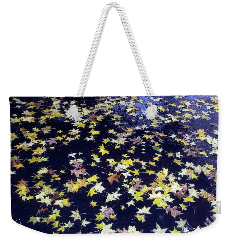 Yellow Weekender Tote Bag featuring the photograph Leaves on Pavement by William Slider