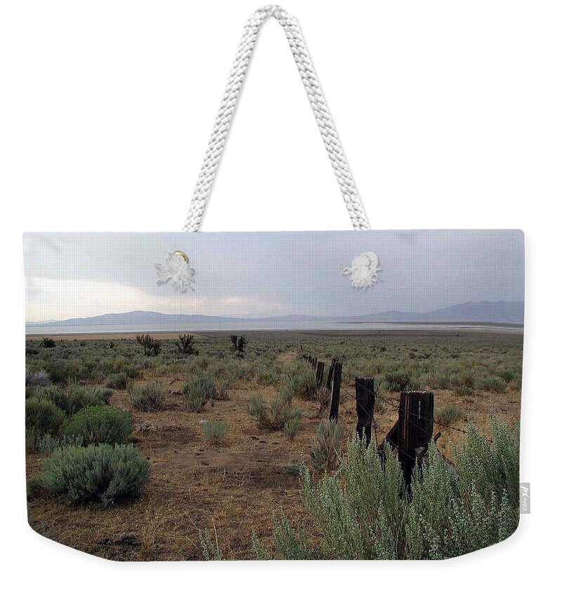 Nevada Weekender Tote Bag featuring the photograph Leaving Reno by DArcy Evans