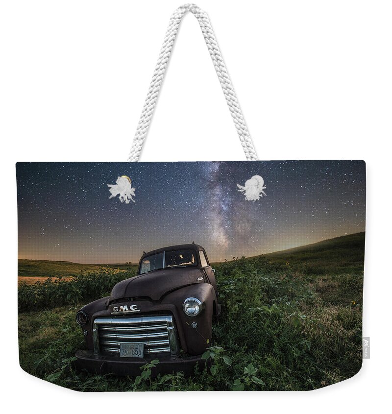 Usa Truck Top Pierre Abandoned Space Decay Rural Farm Forgotten Rust Astronomy Chrome Milky Way Weekender Tote Bag featuring the photograph Left to Rust by Aaron J Groen