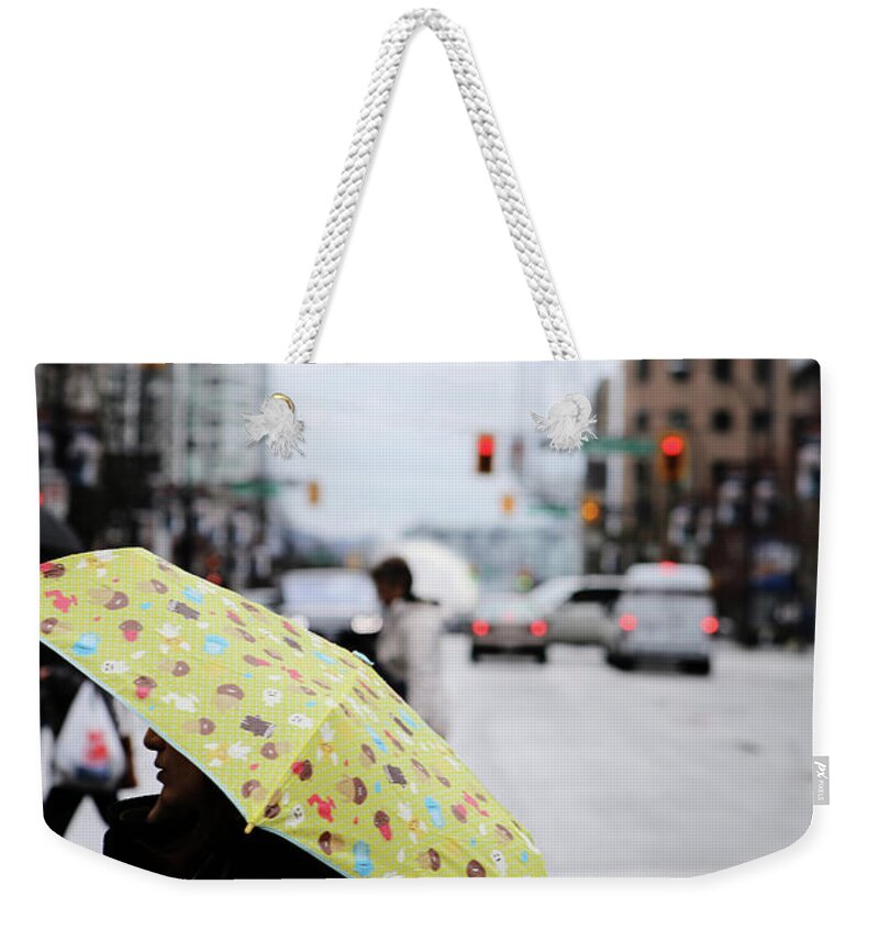 Street Photography Weekender Tote Bag featuring the photograph Lemons and rubber boots by J C