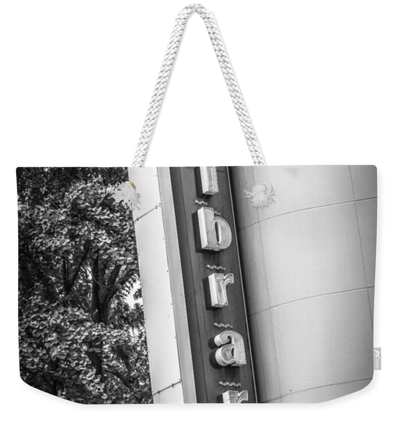 Joan Carroll Weekender Tote Bag featuring the photograph Library Bar BW by Joan Carroll