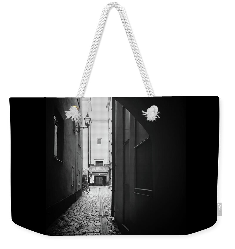 Stockholm Weekender Tote Bag featuring the photograph Light coming through an arch, Stockholm by GoodMood Art