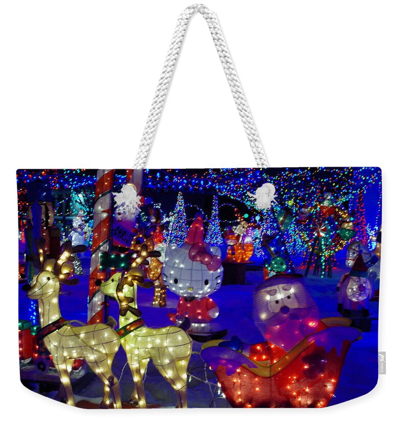 Christmas Lights Weekender Tote Bag featuring the photograph Light Display 1 by Mary Courtney
