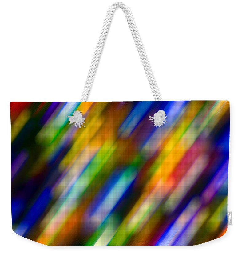 2014 Weekender Tote Bag featuring the photograph Light in Motion by SR Green
