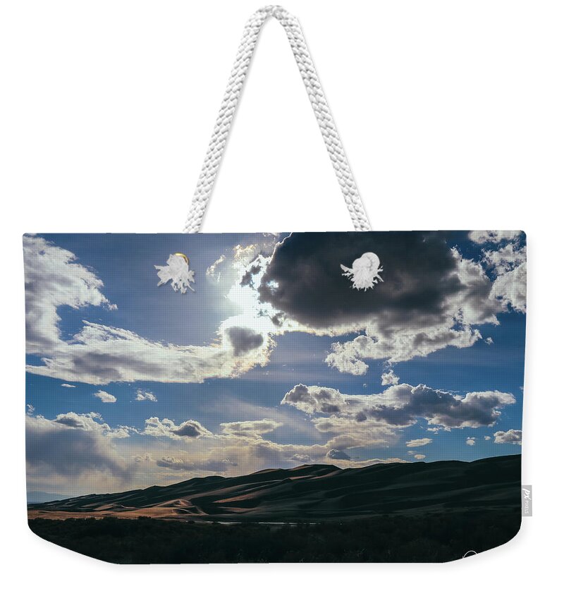 Canon 7d Mark Ii Weekender Tote Bag featuring the photograph Light in the Distance by Dennis Dempsie
