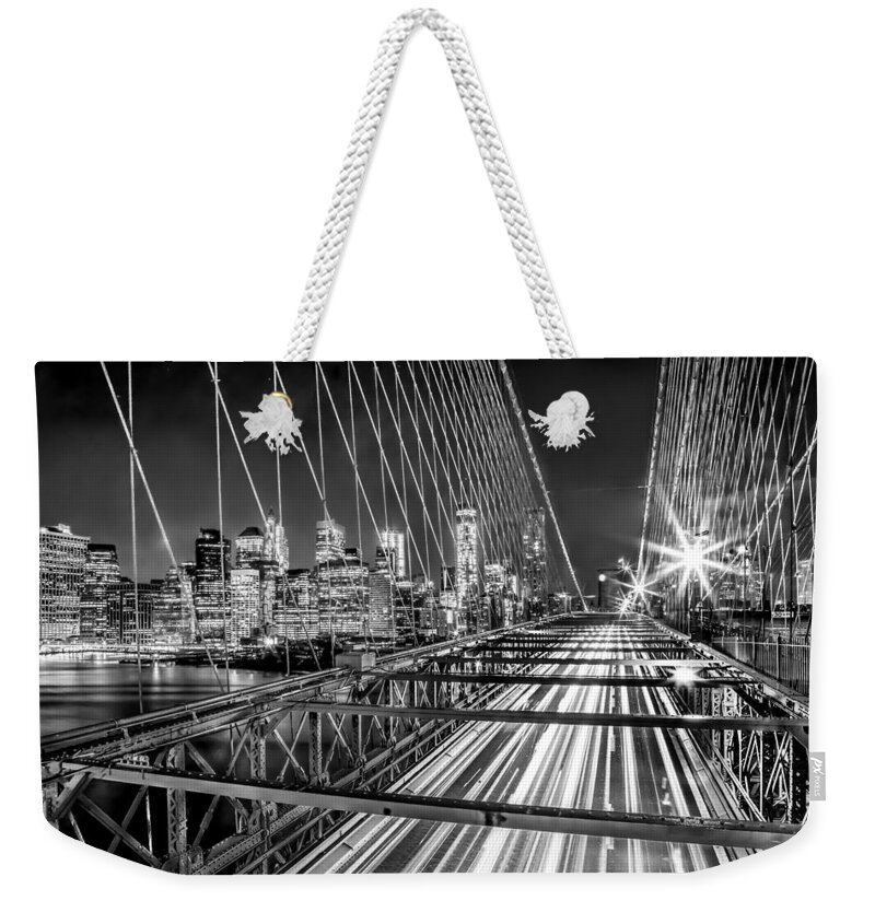 Brooklyn Bridge Weekender Tote Bag featuring the photograph Light Trails Of Manhattan by Az Jackson
