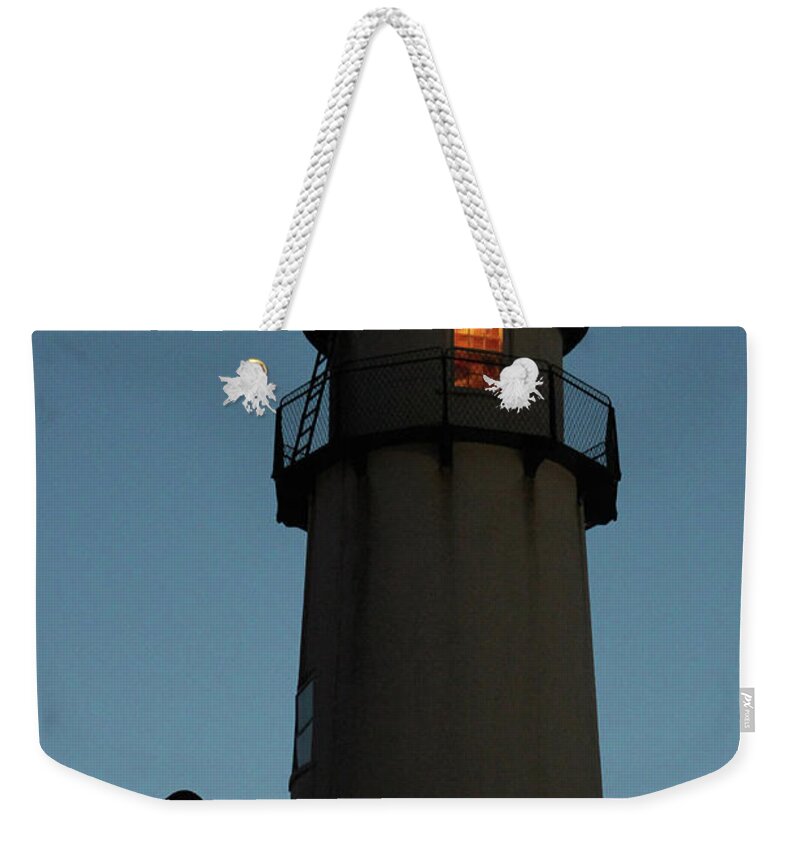 Lighthouse Weekender Tote Bag featuring the photograph Lighthouse Aglow by Robert Banach