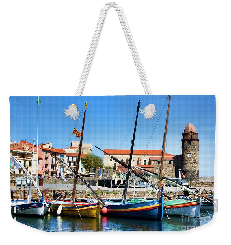 France Weekender Tote Bag featuring the photograph Lighthouse Boats Sea Collioure France by Chuck Kuhn
