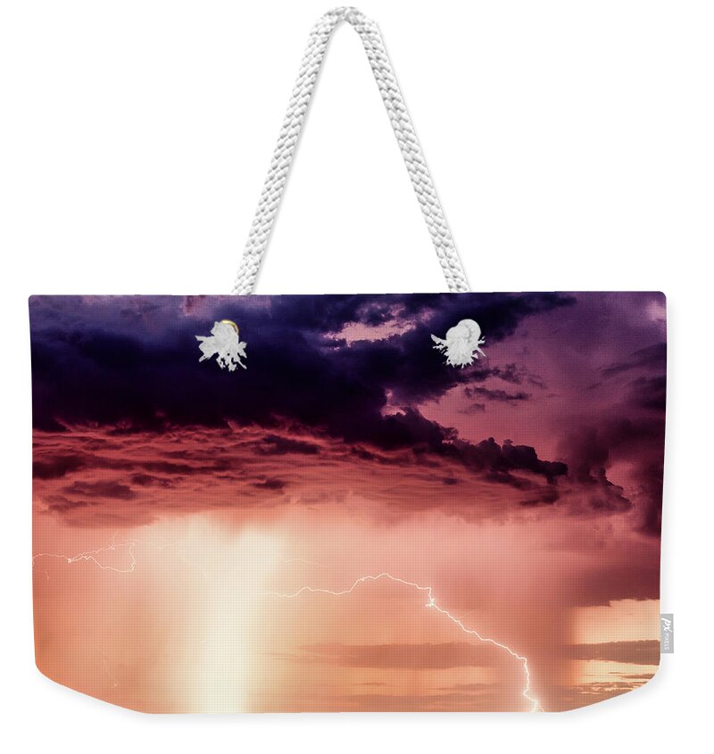 Lightning Weekender Tote Bag featuring the photograph Lightning at Sunset by Michael Newberry