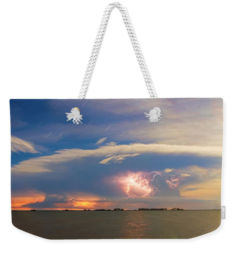 Storm Weekender Tote Bag featuring the photograph Lightning at Sunset with Star Trails by James BO Insogna