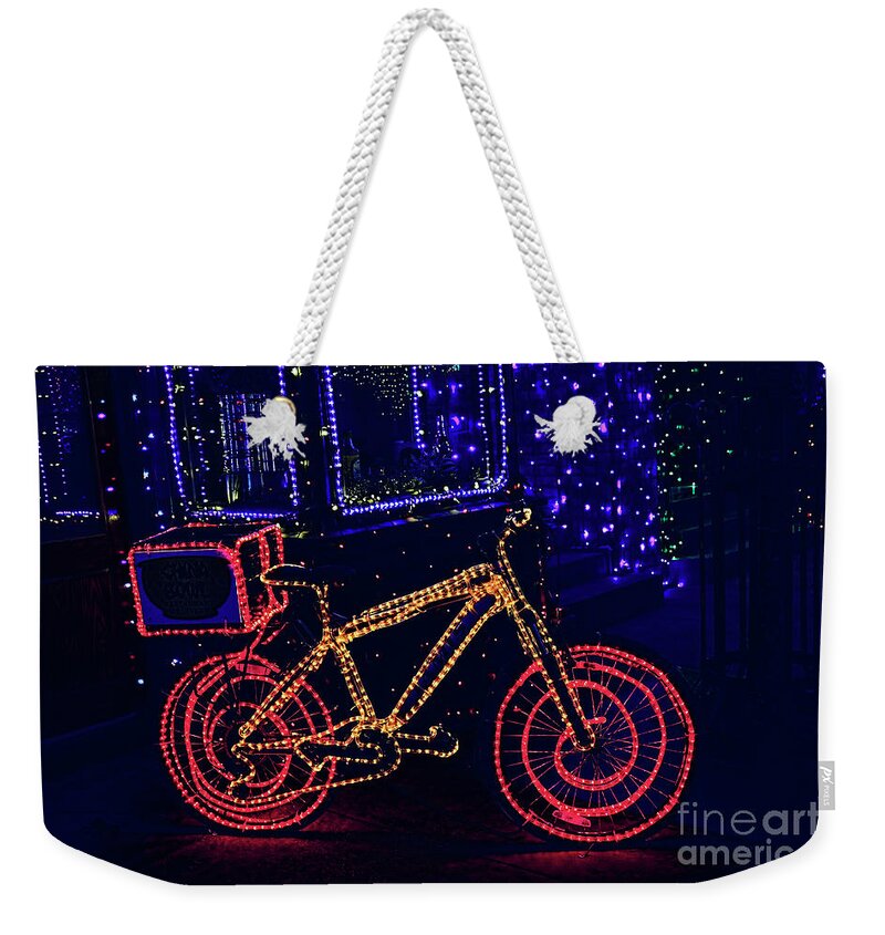 Top Artist Weekender Tote Bag featuring the photograph Lights in Orlando by Norman Gabitzsch