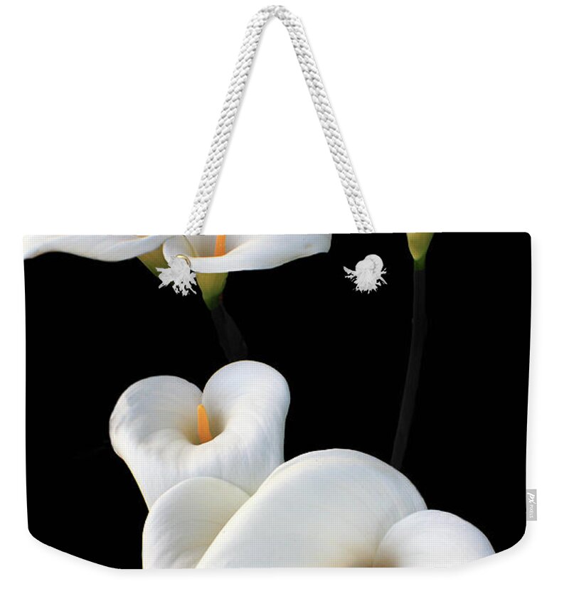 Lily Weekender Tote Bag featuring the photograph Lilies by Aidan Moran