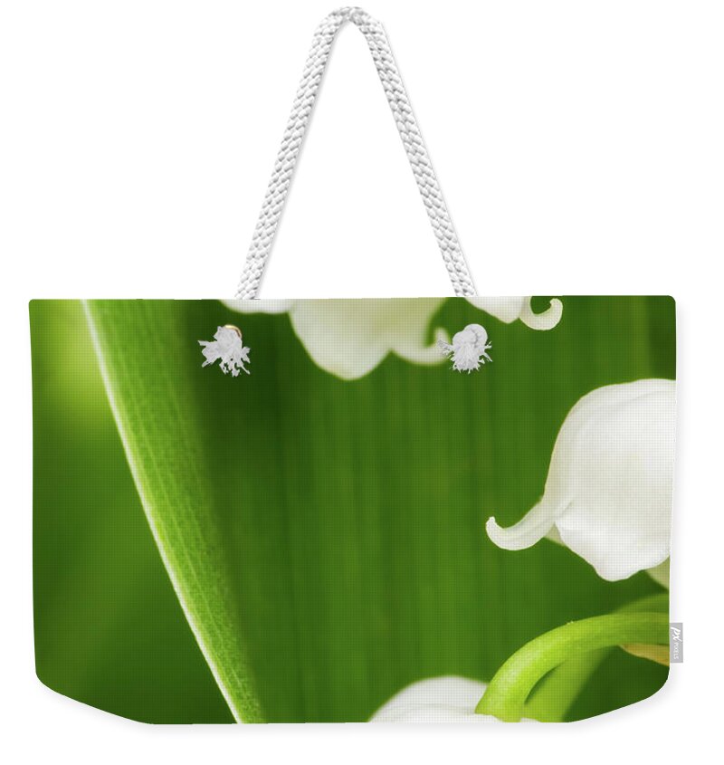 Lily Of The Valley Weekender Tote Bag featuring the photograph Lily of the Valley by Wim Lanclus