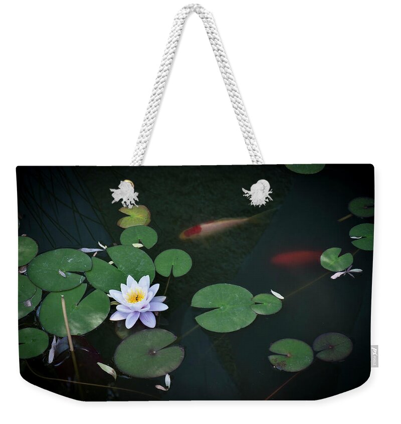 Pond Weekender Tote Bag featuring the photograph Lily Pad Flower and Koi by Mary Lee Dereske