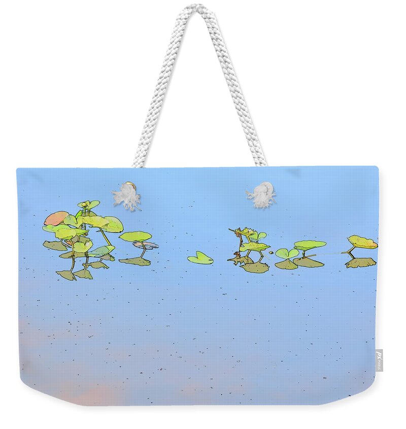 Lily Pad Weekender Tote Bag featuring the photograph Lily Pad Glow by Florene Welebny