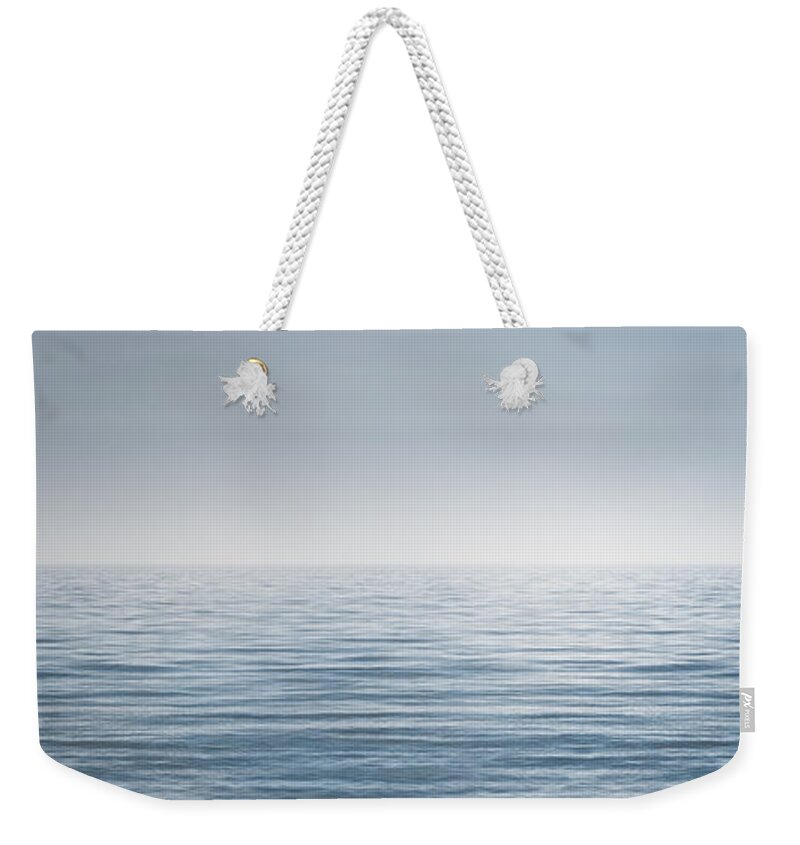 Water Weekender Tote Bag featuring the photograph Limitless by Scott Norris
