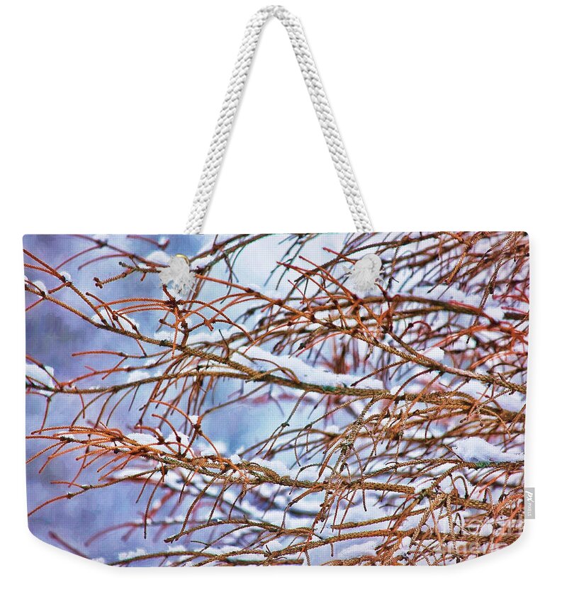 Winter Weekender Tote Bag featuring the photograph Lingering Winter Snow by Sharon McConnell