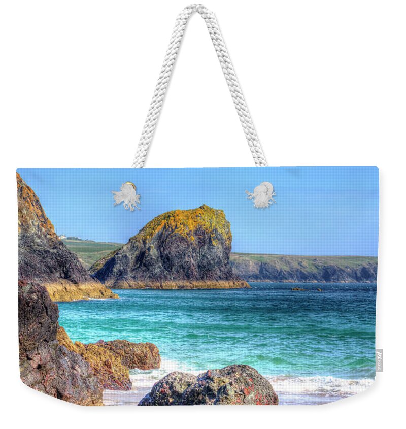 Kynance Weekender Tote Bag featuring the photograph Lion Rock from Kynance Cove by Hazy Apple