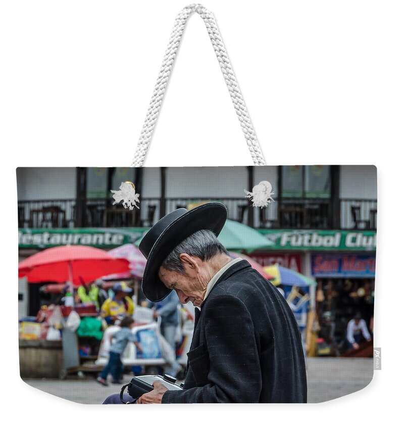 Transistor Radio Weekender Tote Bag featuring the photograph Listening to the oldies by Jaime Mercado
