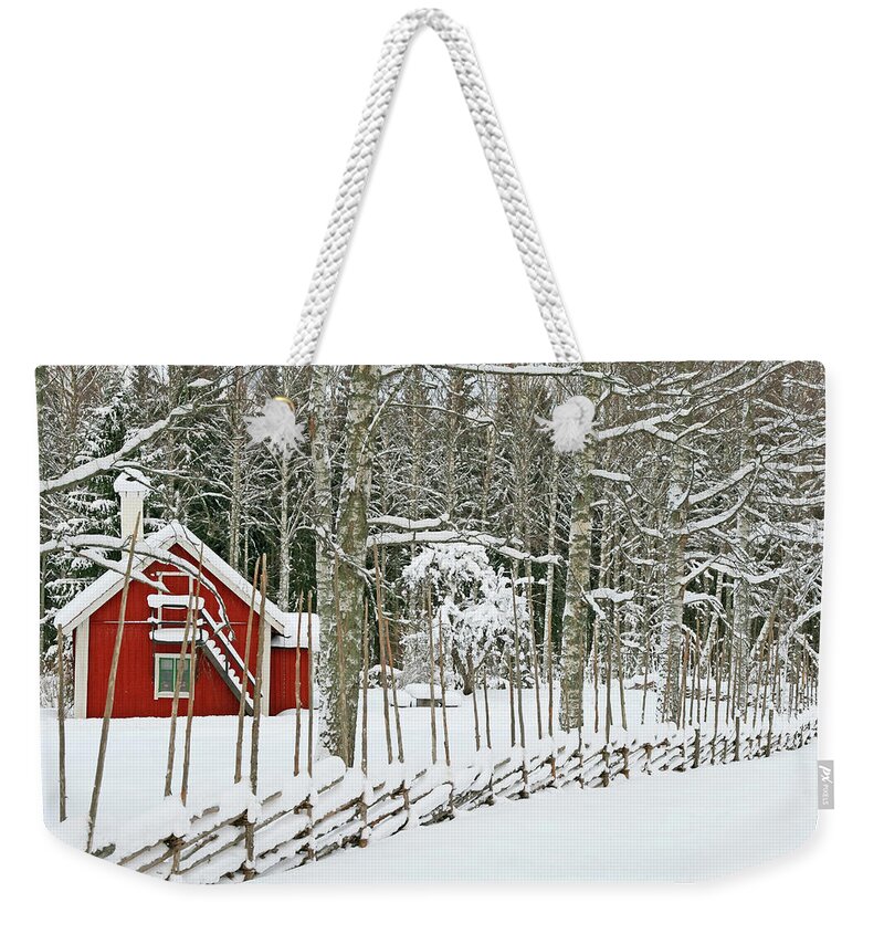 House Weekender Tote Bag featuring the photograph Little red house covered by snow by GoodMood Art