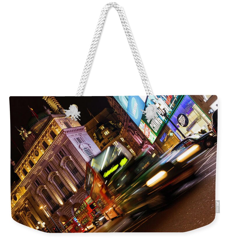London Weekender Tote Bag featuring the photograph London Bustle by Rick Deacon