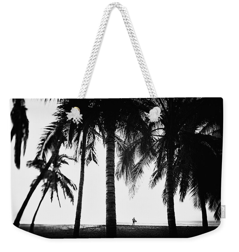 Surfing Weekender Tote Bag featuring the photograph Lone Wolf by Nik West