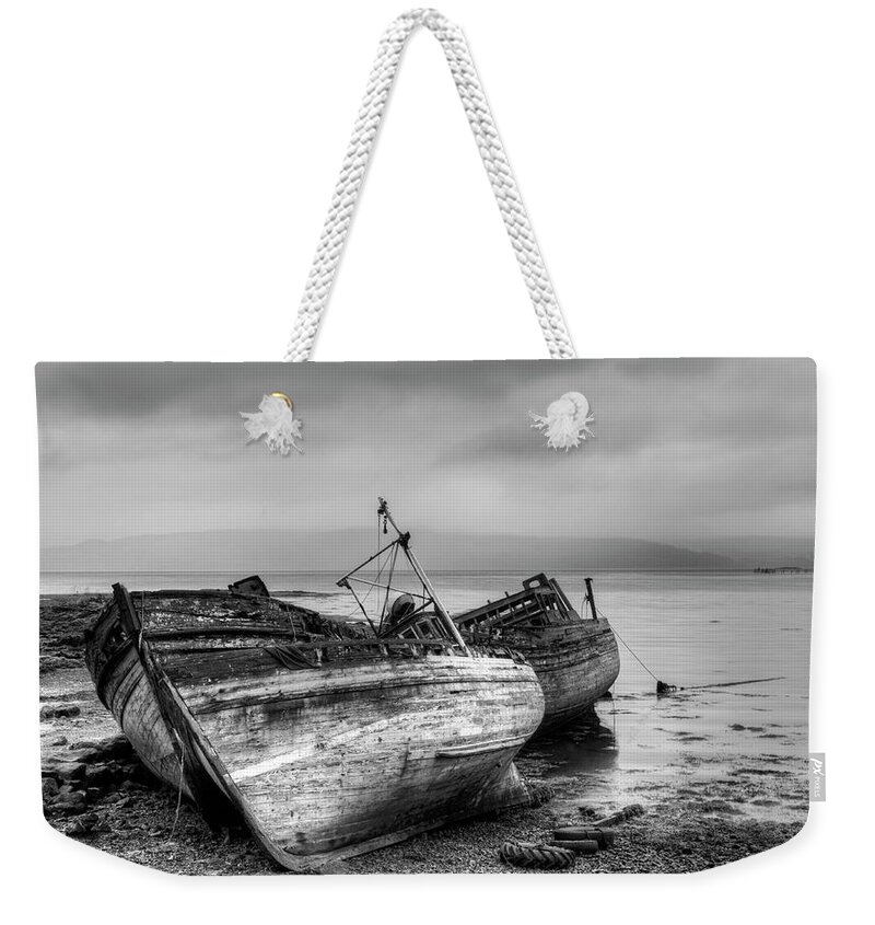 Isle Of Mull Weekender Tote Bag featuring the photograph Lonely fishing boats by Michalakis Ppalis