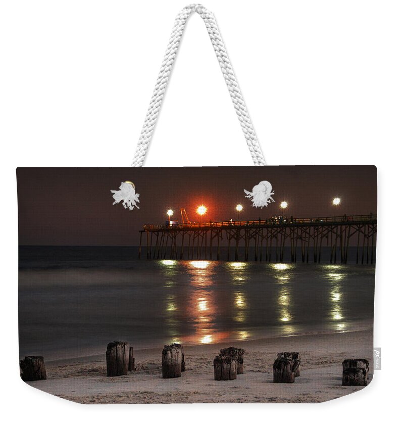 Carolina Beach Fishing Pier Print Weekender Tote Bag featuring the photograph Long After Dark by Phil Mancuso